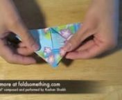 This origami video shows how to make a butterfly by starting with the water bomb base.