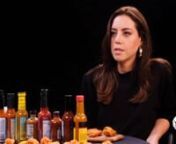 From season 9 of Hot Ones. Aubrey Plaza gives Sauce Bae hot sauce a try.