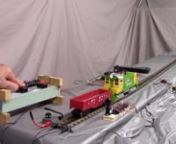 * This Video #823 shows an MTH 3-Rail O ga. Proto 3 Railking SW1200 Diesel -- automatically running back &amp; forth
