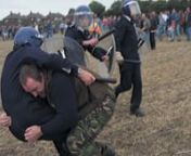 This video excerpt is taken from &#39;The Battle of Orgreave&#39; a video work by Jeremy Deller &amp; Mike Figgis.n16 June 2001 - 17 June 2001nnJeremy Deller&#39;s reenactment of the 1984 clash between striking miners and police at Orgreave in South Yorkshire on 17 June 2001 was filmed by Mike Figgis for Artangel Media and Channel 4, and aired on Sunday, 20 October 2002. nnThis is an excerpt from this film which intercuts dramatic photographic stills from the clashes in 1984 with footage of the clashes re-e