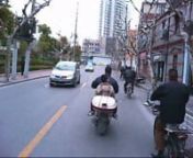 Video captured from helmet camera on ride to work through streets of Shanghai, China. Played at 2x speed - people in China don&#39;t really walk that fast ;)nnThe scooter is a 1000w electric which looks like a Honda Ruckus. It&#39;s capable of going about 50km/h, which is plenty fast for the insanity which is Shanghai traffic. nnNote the dogs in the lane towards the end of the video. Last week I witnessed a multi-vehicle pile-up caused by them - hence my desire to mount a camera on my helmet.