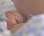 Get 100&#39;s of FREE Video Templates, Music, Footage and More at Motion Array: https://www.bit.ly/2UymF81nnnnGet this here: https://motionarray.com/stock-video/newborn-143102nnThis is a captivating static footage of a mother breastfeeding her newborn baby in a maternity hospital. The baby is small and precious and is focused on her mother&#39;s face as she receives nourishment. This can be a lovely establishing shot for documentaries, news stories and movies about motherhood, breastfeeding, babies, hea