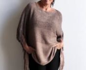 This Cocoon Cardigan with on-trend boho tassels is a winter knit shrug that adds a chic layer of warmth to your outfit.nnA roomy, open-front style that genuinely fits all sizes (8 to 20), the Vail Cocoon Cardigan works with both light layers and warmer tops. nnMade with a soft, machine-washable acrylic yarn featuring a shimmering metallic thread contrast that works for both day and evening wear.