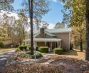 GORGEOUS LUXURY LIVING - 2,926 sf custom home nestled on 2 ac (m/l) wooded lot. Efficient, low maint, 4 BR, 2.5 BA metal roof, extra rooms, storage, 3 car gar. Lrg kitchen, custom solid walnut cabinets, slide-out shelves, pantry, nook. Private master suite w/full bath, large walk-in closet, laundry, sitting room w/view, private entrance to sunroom. Dining room, family room, office, sunroom. Geothermal HP, WH Gen, wood fireplace, many extras. Just out of town, near shopping, business, medical, la