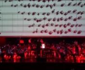 Symphony for Orchestra, Light and Videonlive video compositionn14 x 5 m (46 x 16 ft)nSound and Color concertnJugendblasorchester FriedrichshafennGraf-Zeppelin-HausnFriedrichshafen, Germanyn2015nFor Phillipe Wozniak&#39;s version of Prometheus 2015, I developed a series of short videos from the landscape, and urban settings. I am onstage with the orchestra using VJ software Resolume Arena with an AKAI controller to coordinate moving photographs, layered imagery and moving light to correspond with the