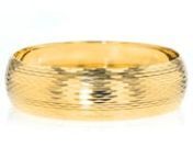 https://www.ross-simons.com/921935.htmlnnOur splendid bangle bracelet is a must-have. Shining in textured and polished finishes of 14kt yellow gold, this Italian-crafted bangle bracelet truly works with any outfit. 3/4