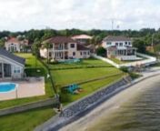 AMAZING WATERFRONT 2016 Custom Home with 4 Bedrooms, 2.5 Bathrooms, Office, Loft Area, and Bonus Room. Huge .61 Acre Sound Front Lot with 115 Feet of Prime Santa Rosa Sound Water Frontage, Boasting 3126 Sq Ft of Heated &amp; Cooled Living Space and a Total Space Under the Roof of 5568 Sq Ft! This Incredible Home is Equipped with a 3 Car Garage AND an Almost 1K Sq Ft RV/Boat Garage with 16 Ft Ceilings AND is Located in FLOOD ZONE X, AND has a Whole Home Generator! Relax in the Back Yard Oasis Out