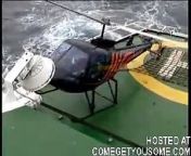 This is a Turbine Enstrom Helicopter on the Heli Pad of a Greenpeace ship some where off the coast of Ireland. One of the deck straps has not been released correctly, with what was very nearly disastrous consequence. Pilot skill and quick thinking saved t
