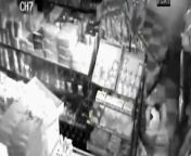Surveillance camera captures moment that Bronx bodega worker, 20, is fatally shot by NYPD after masked gunmen stick up Morrisania shop&#60;br/&#62;&#60;br/&#62;The NYPD was responding to the armed robbery when a cop and the fleeing shop worker fatally collided, police said. The loot: &#36;700 in cash, lottery tickets and cigarettes. &#39;He didn&#39;t have his hands up and they shot him,&#39; the victim&#39;s cousin said. &#39;They didn&#39;t say nothing. They just shot him. He was just trying to run away because he was scared.
