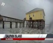 Tropical Storm Lee dumps rain on an already-soggy South, causing scattered flooding and power outages. The storm&#39;s presence could be felt on Dauphin Island, Ala. where waves broke on empty beaches.