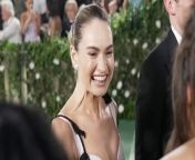 Lily James chats with The Hollywood Reporter on the Met Gala 2024 steps and reveals she got &#92;