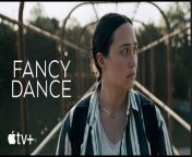 The bond between an Indigenous girl and her aunt proves stronger than ever when their loved one goes missing.&#60;br/&#62;&#60;br/&#62;Lily Gladstone stars in Fancy Dance, directed by Erica Tremblay, streaming June 28. https://apple.co/_FancyDance&#60;br/&#62;&#60;br/&#62;Since her sister’s disappearance, Jax (Lily Gladstone) has cared for her niece Roki (Isabel Deroy-Olson) by scraping by on the Seneca-Cayuga reservation in Oklahoma. Every spare minute goes into finding her missing sister while also helping Roki prepare for an upcoming powwow. At the risk of Jax losing custody to Roki’s grandfather, Frank (Shea Whigham), the pair hit the road and scour the backcountry to track down Roki’s mother in time for the powwow. What begins as a search gradually turns into a far deeper investigation into the complexities and contradictions of Indigenous women moving through a colonized world while at the mercy of a failed justice system. Gladstone stars alongside Deroy-Olson, Ryan Begay, Crystle Lightning, with Audrey Wasilewski and Whigham.&#60;br/&#62;