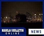 A major bridge in the US city of Baltimore almost entirely collapsed Tuesday after being struck by a container ship, sending multiple vehicles and up to 20 people plunging into the harbor below.&#60;br/&#62;&#60;br/&#62;Dramatic footage showed a 300-meter vessel hitting the footing of the Francis Scott Key Bridge, sending the steel-built structure crashing into the Patapsco River.&#60;br/&#62;&#60;br/&#62;Up to 20 people are feared to be in the water after a bridge collapsed into a river in the US city of Baltimore following a ship strike.&#60;br/&#62;&#60;br/&#62;READ MORE: https://mb.com.ph/2024/3/26/major-baltimore-bridge-collapses-after-ship-collision